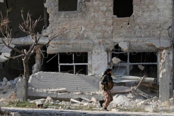 A member of Forces loyal to Syria