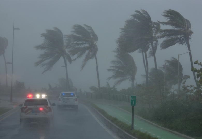 Police patrol the area as Irma approaches San Juan, Puerto Rico. REUTERS/Alvin Baez