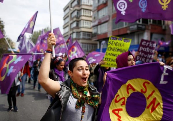 A woman shouts slogans as people arrive to attend a May Day rally in Istanbul, Turkey May 1, 2017. REUTERS/Osman Orsal