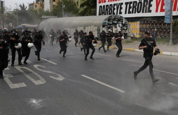 Turkish riot police launches tear gas grenades and fires rubber pellets at demonstrators during an attempt to defy a ban and march on Taksim Square to celebrate May Day in Istanbul, Turkey May 1, 2017. REUTERS/Huseyin Aldemir