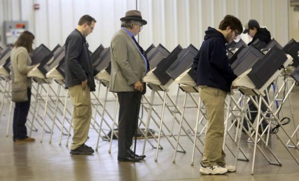 Voters cast their votes during the U.S. presidential election in Medina, Ohio, U.S. November 8, 2016. REUTERS/Aaron Josefczyk