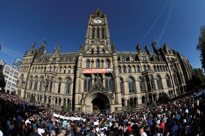 People attendn a vigil for the victims of an attack on concert goers at Manchester Arena, in central Manchester, Britain May 23, 2017. REUTERS/Jon Super